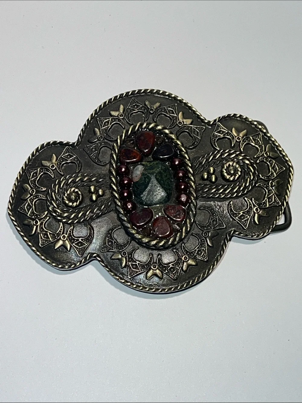 Ornate Metal Belt Buckle with Green Center and Burgundy Accents Stones